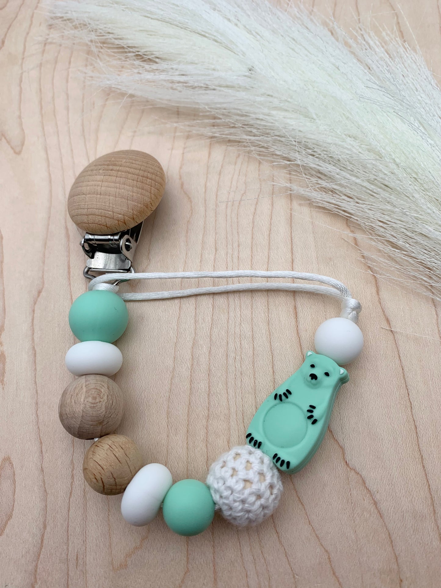 Attache suce petit ours polaire - clip bois