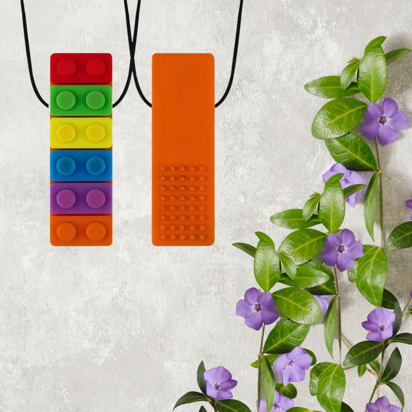 Collier sensoriel de dentition Lego